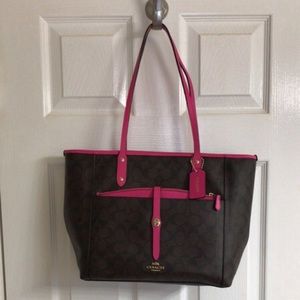 Pink and brown Coach tote